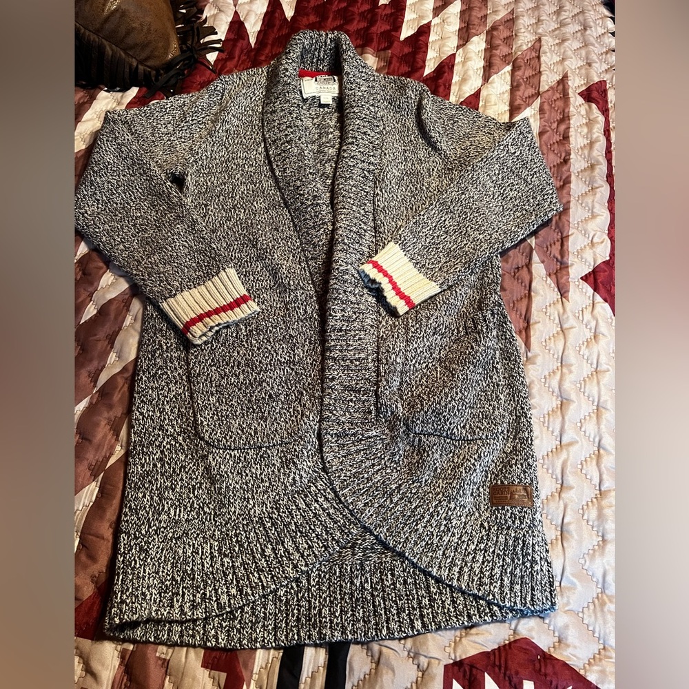 Cozy up in this warm Roots sweater